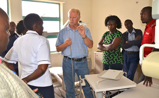 assisting Kenyan children with learning about dental health